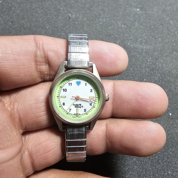 Nurse Mates Ladies Quartz Watch Silvertone Green And White Dial Working shows si - Picture 1 of 9